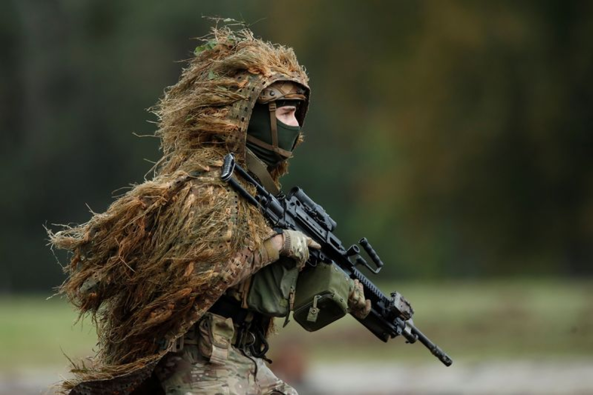 Titre: « Service national volontaire ? Un sacrifice en laque pour la nation »